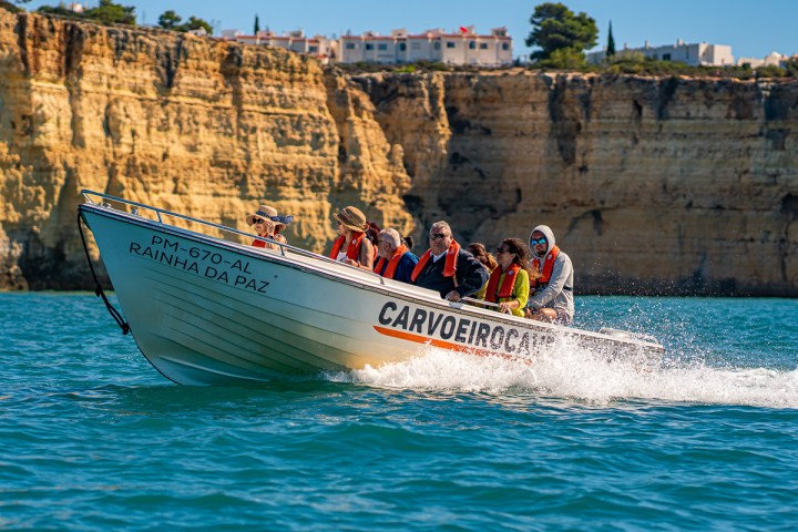 a small boat in a body of water