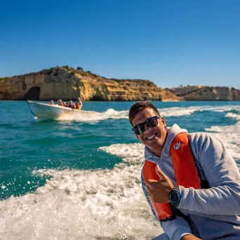 a person riding a surf board on a body of water